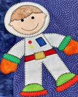 a boy astronaut with orange gloves and green boots 