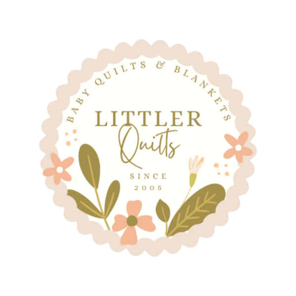 circle logo of littler quilts with flowers and leaves