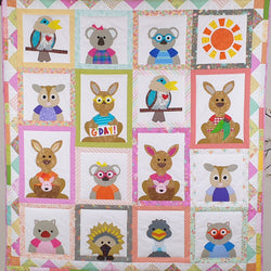 quilt showing kangaroo, posums, emu and koala