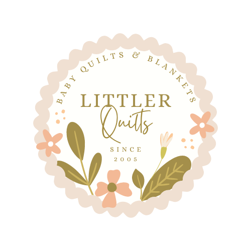 a round logo design with a frilly cream outside with littler quilts in the middle surrounded by orange flowers and green leaves