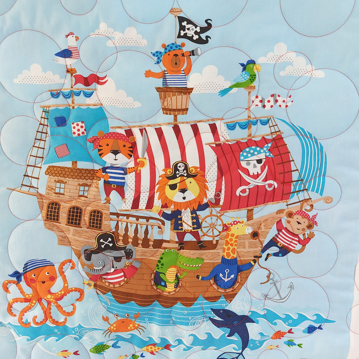 Children's illustration of a pirate ship with various pirates and sea creatures on a blue background.