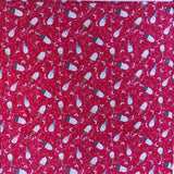 Pattern of colourful santas on a red background