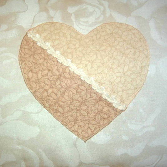 close up of a light and dark cream heart