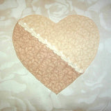 close up of a light and dark cream heart