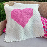 handmade baby blanket with a large pink heart on the front