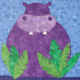 a blue background with a purple hippo with 2 white teeth hiding behind bushes