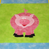 bright green fabric background with a pink smiling pig
