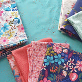 a photo of the fabric selections used to make the quilt