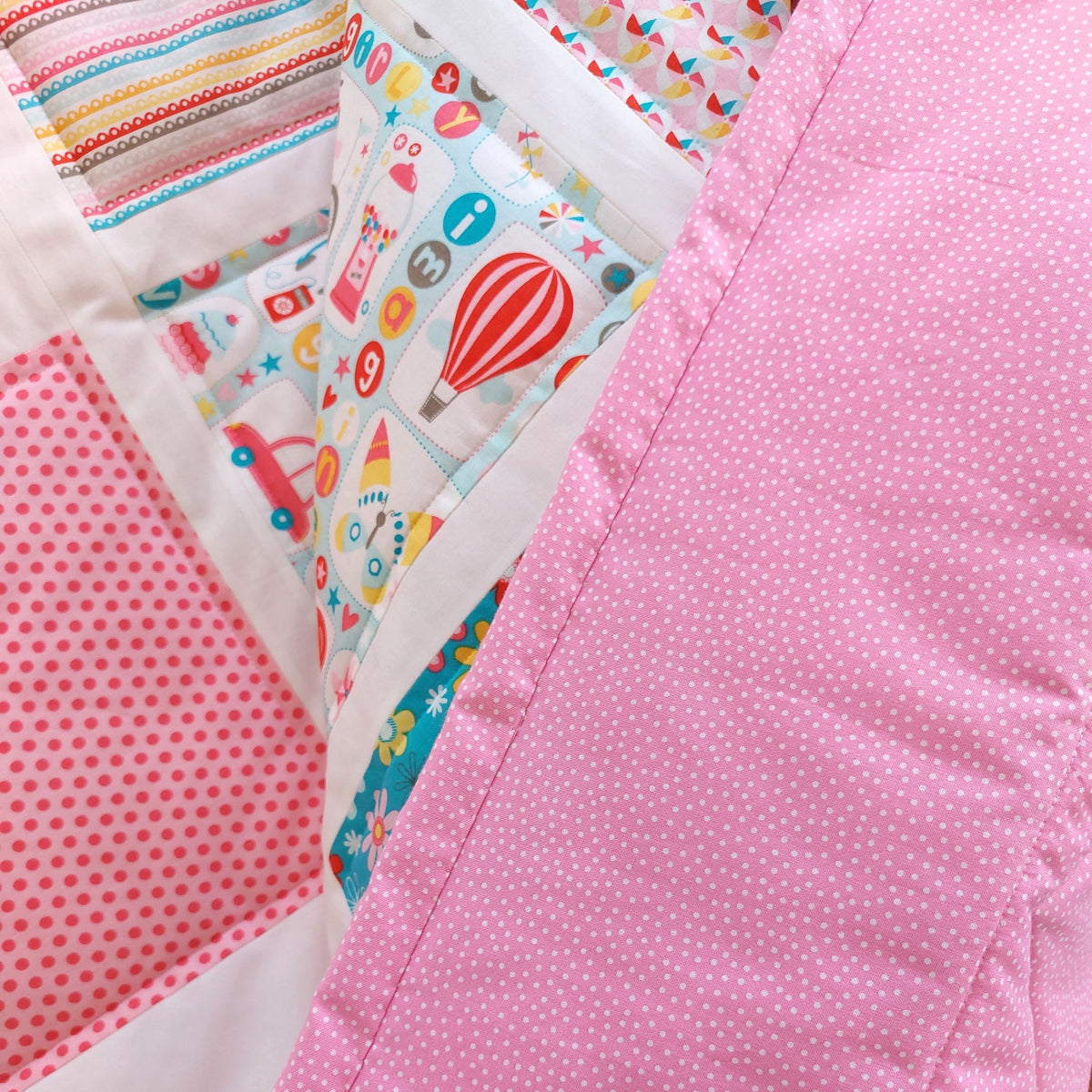 the pink and white dots backing of the girl crazy quilt