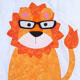 A close up of an orange lion head and body with a bright orange main and the lion is wearing a pair of black glasses