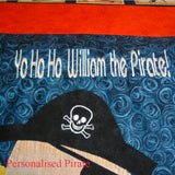 on a blue fabric background is machine embroidered in white, yo ho ho William the pirate!