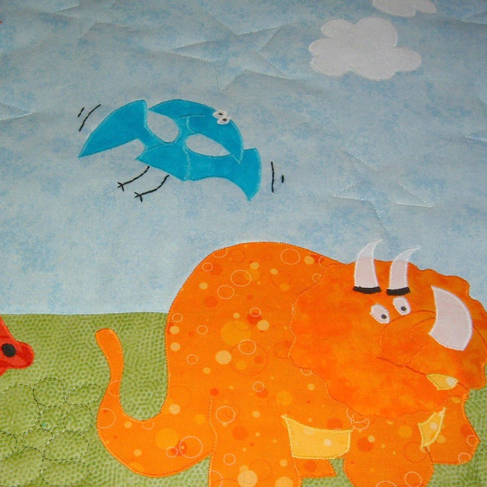 orange dinosaur and blue bird flying above the dinosaur