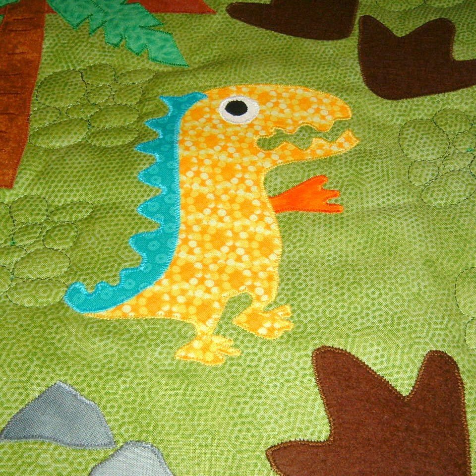 a yellow dinosaur on a green background