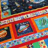 image of planets with descriptions on quilt